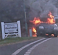 Jeep burning a speed camera